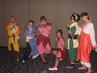 Aang (with Momo), Kitara, Ty Li, Ty Li, Toph, and Earth Kingdom Girl
